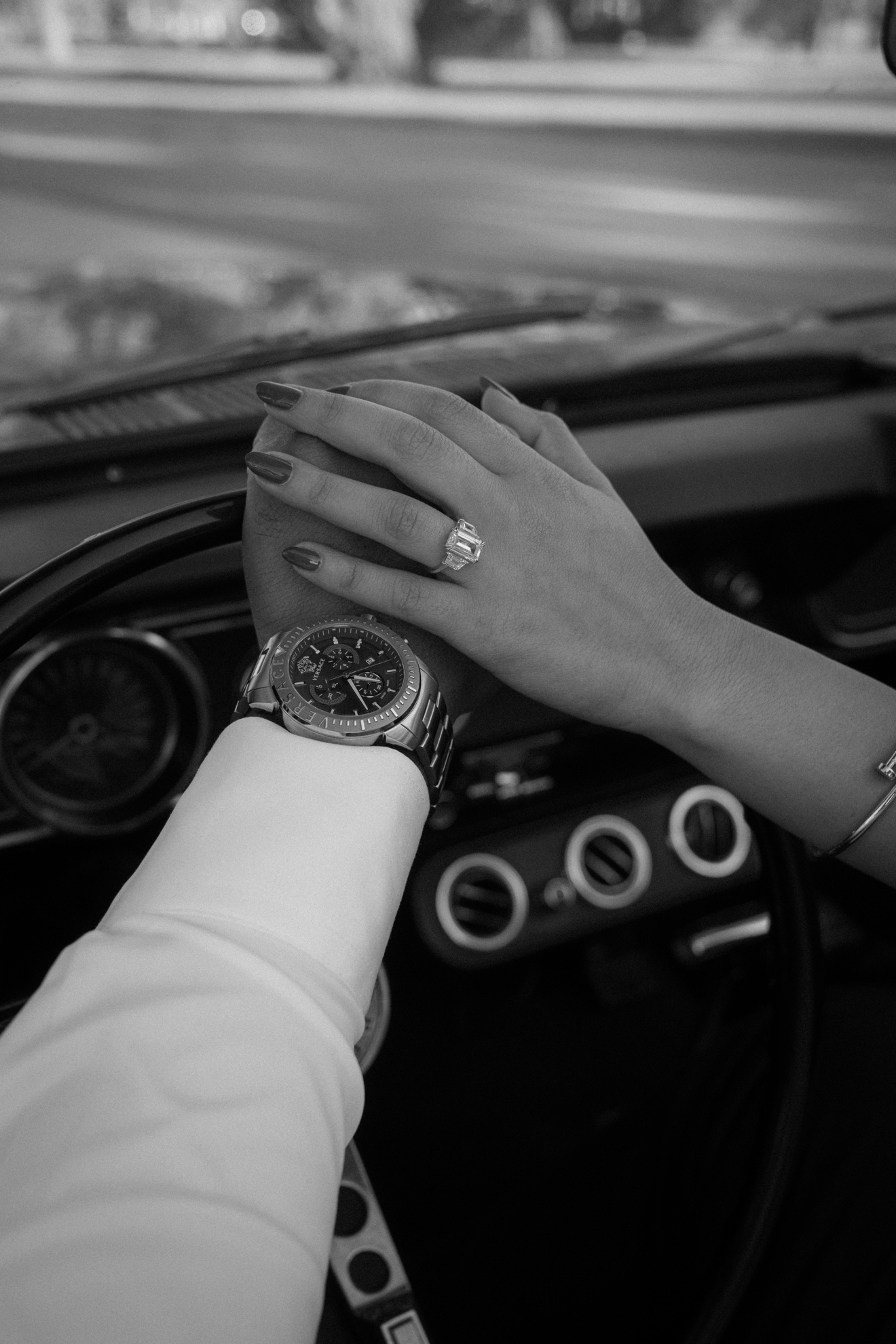 Hussien and Jamiley beside a classic car